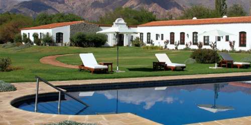 View of the garden, pool and mountains